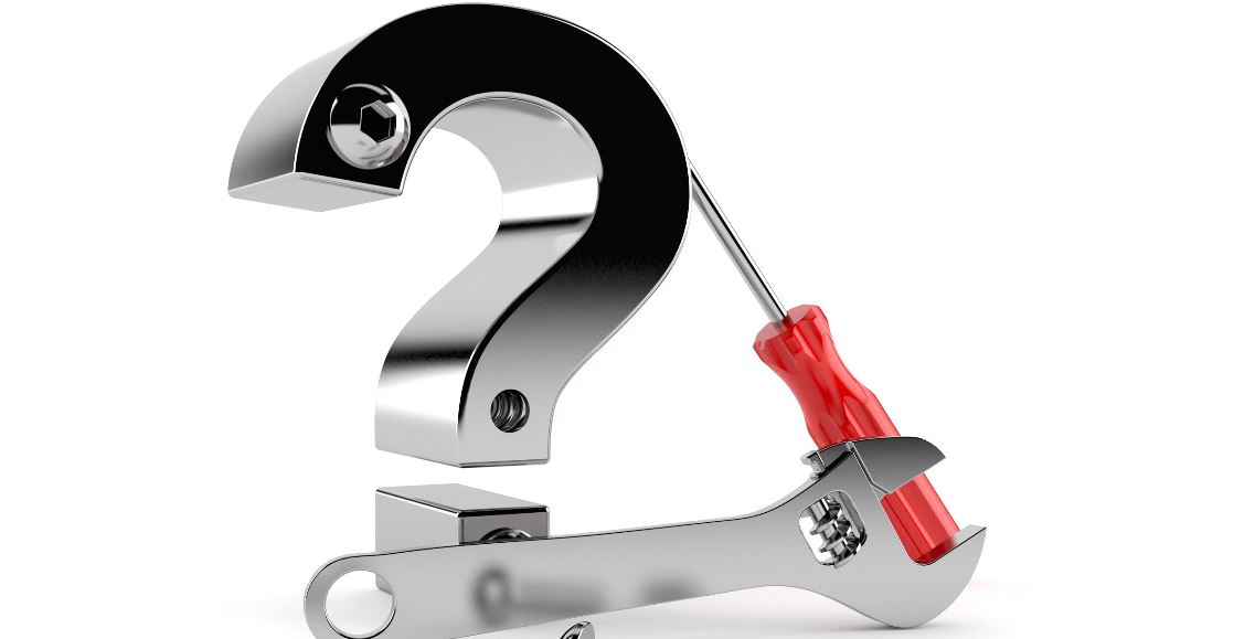 Metal question mark and tools for car maintenance