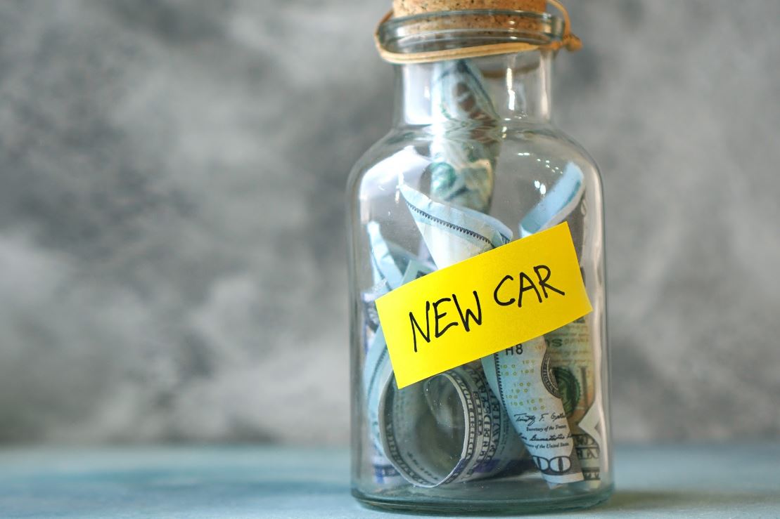 A glass bottle saving for a new car